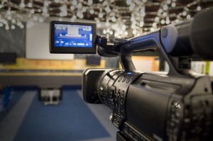 Digital video camera shoots meeting - 3CCD Camcorder recording i