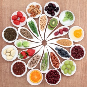 Large health food selection in white porcelain bowls and dishes