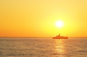 Cargo Ship  Against Colorful Sunset