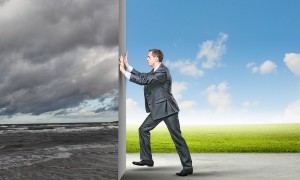 Image of young business man changing reality