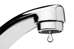 Water tap with drop, isolated on the white background, clipping