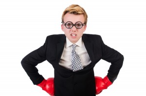 Young businessman boxer isolated on white