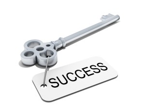 a key with word "success" , business concept